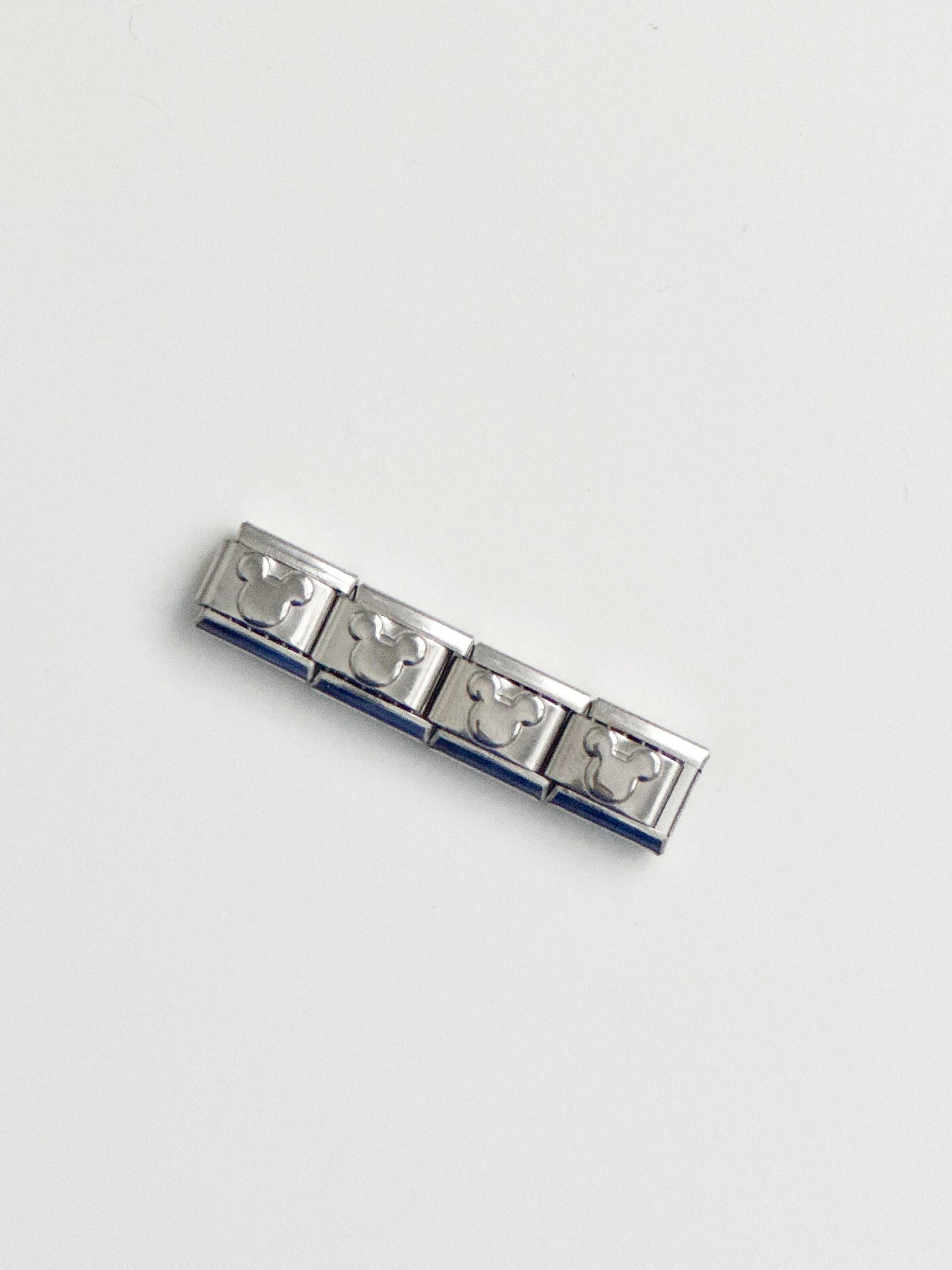 mickey plata charm