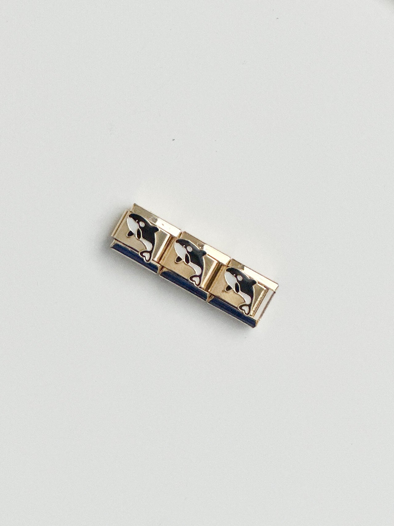 gold whale charm