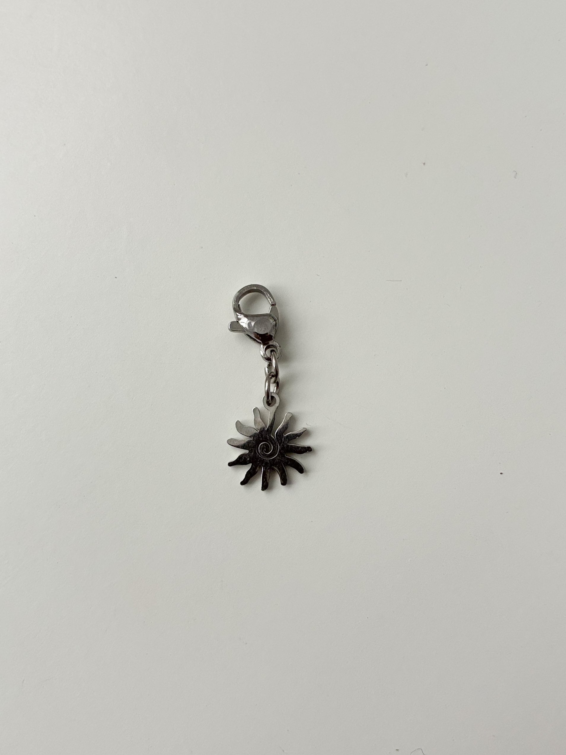 sol plata charm