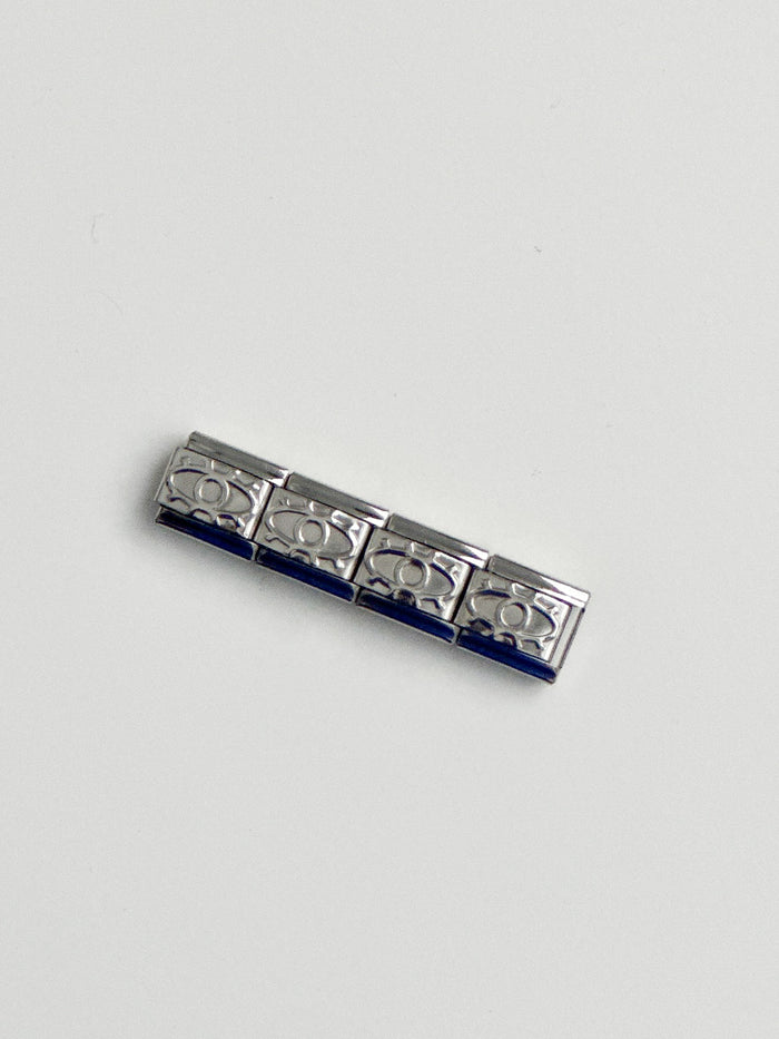 ojo turco plata charm