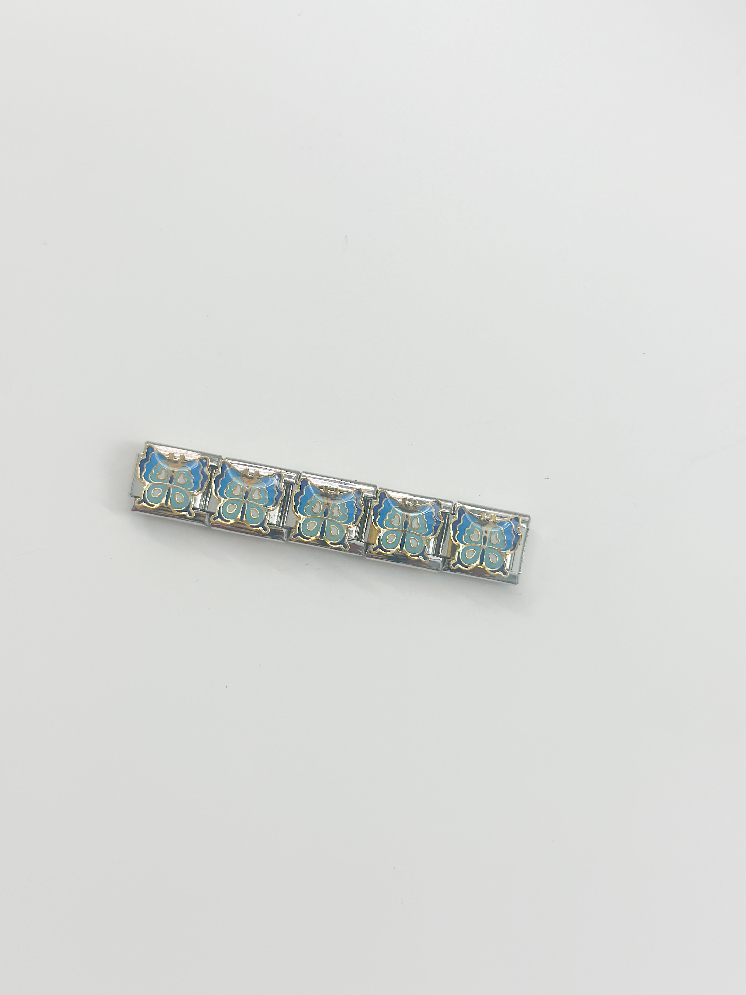 azul claro mariposa charm