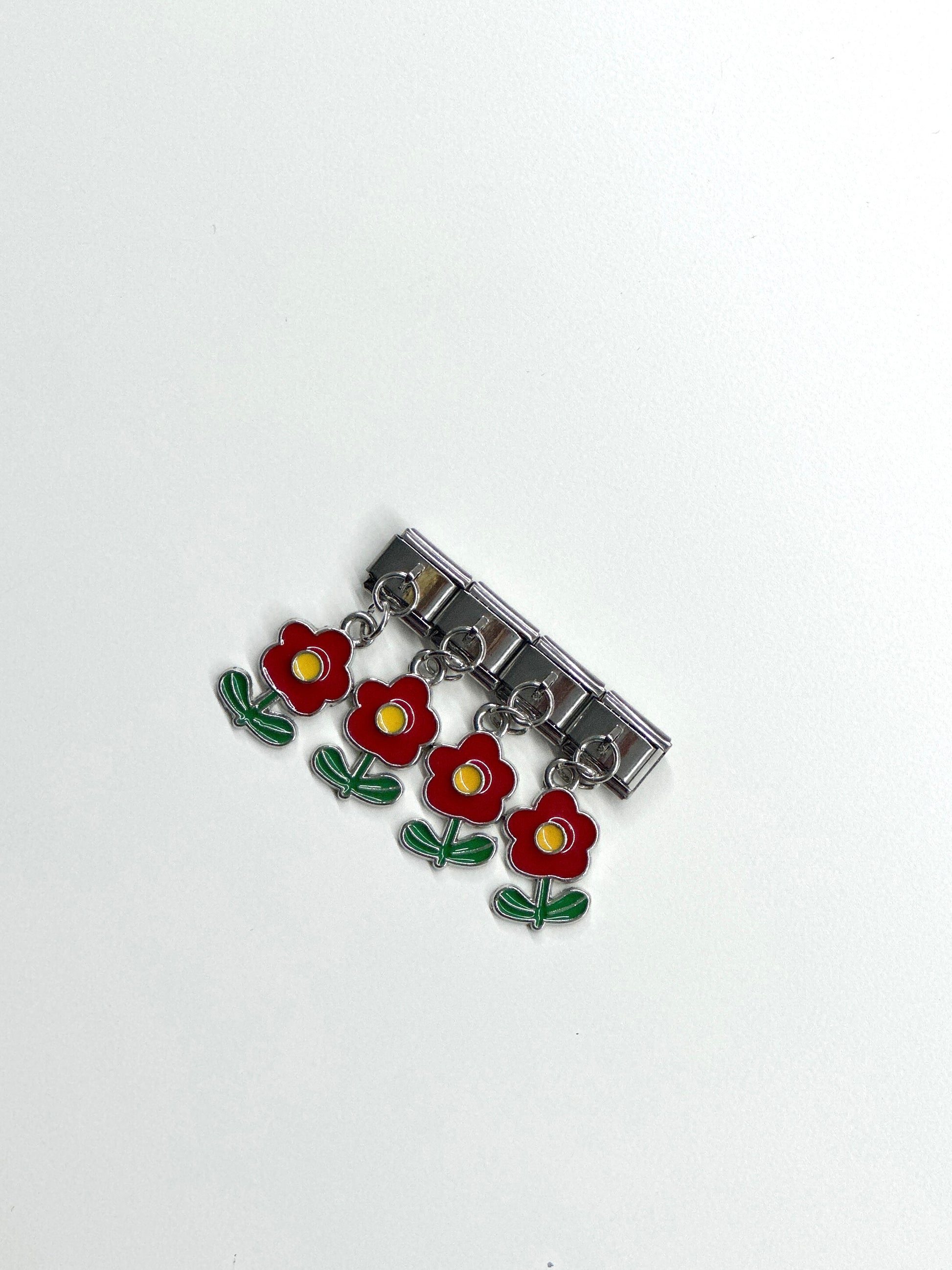 flor roja charm