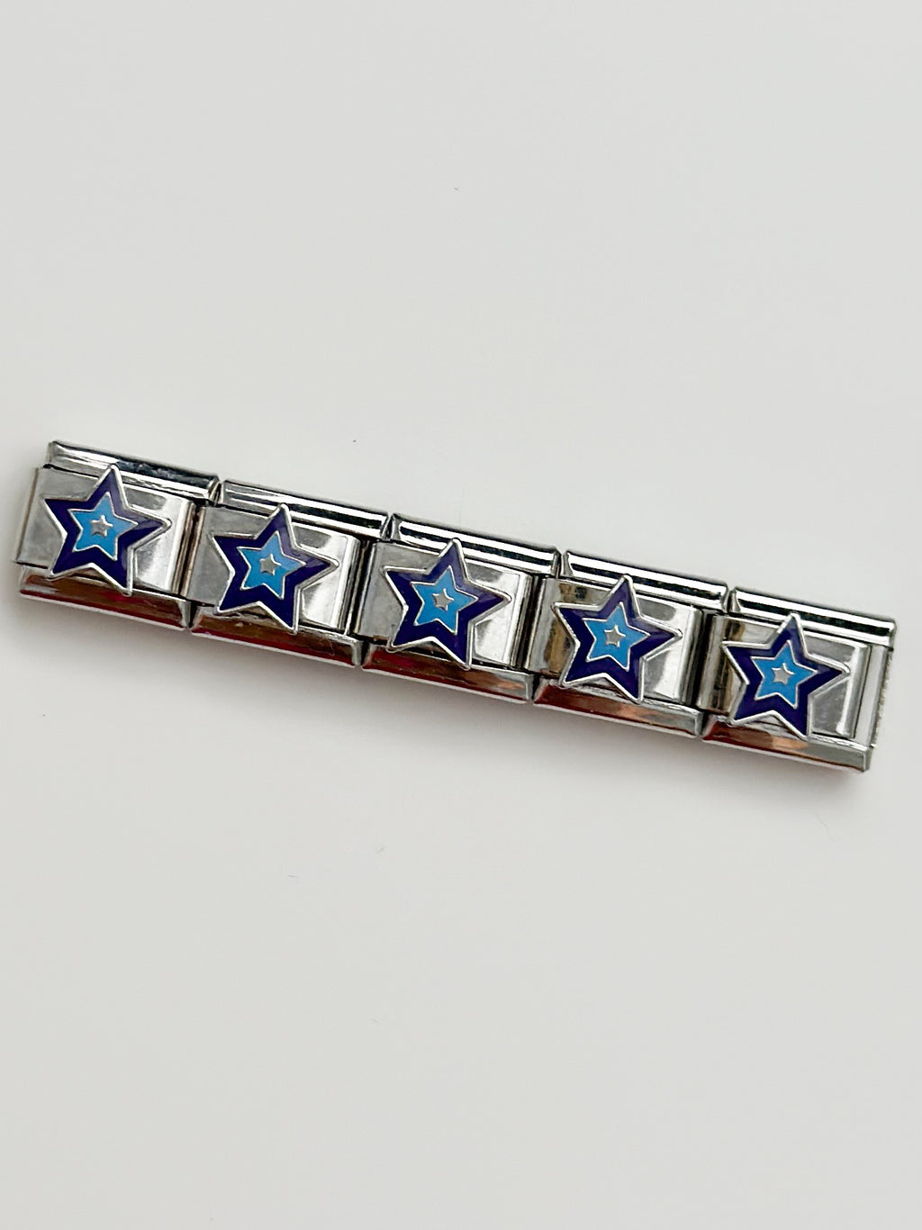 blue and purple star charm