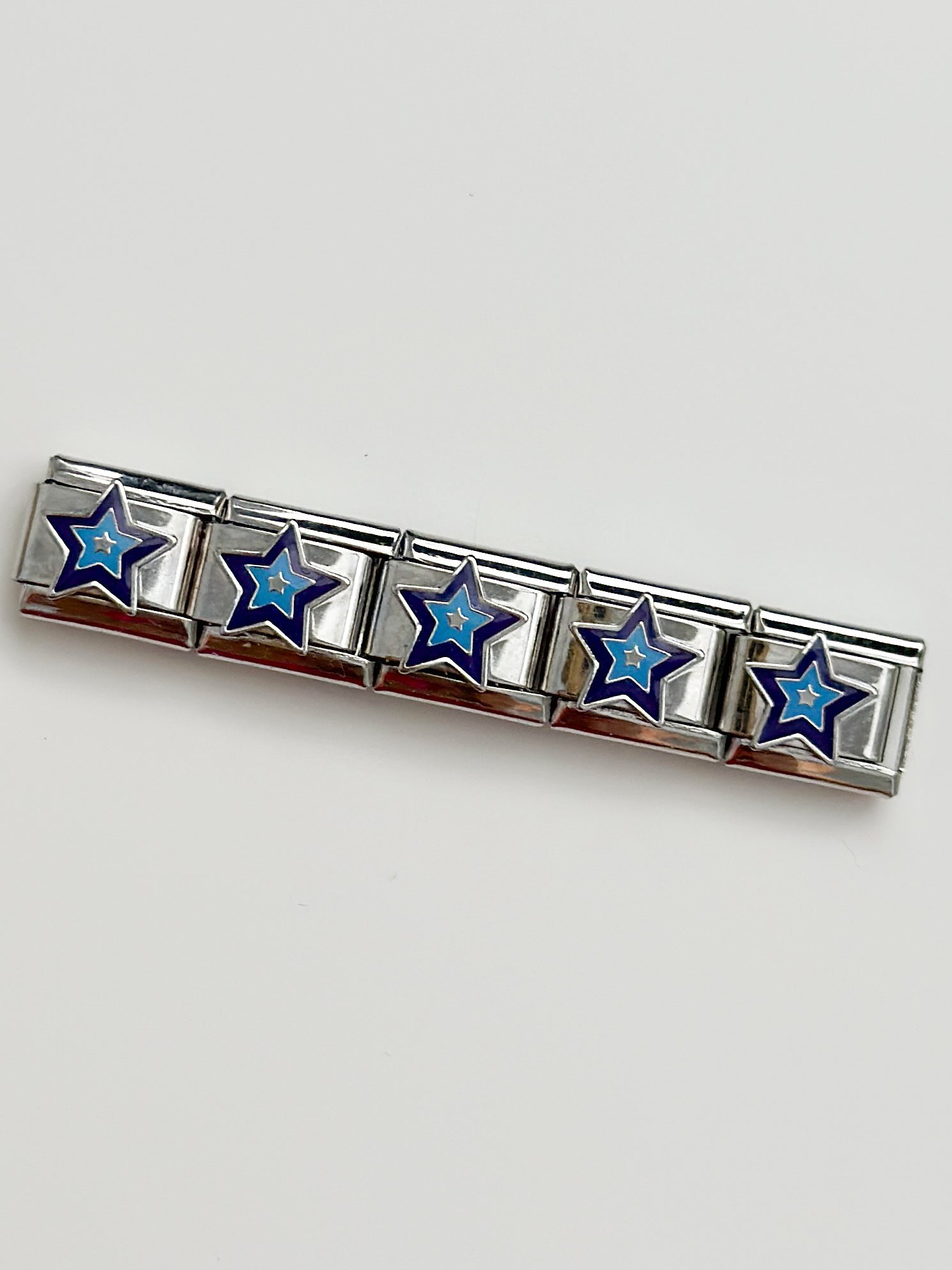 blue and purple star charm
