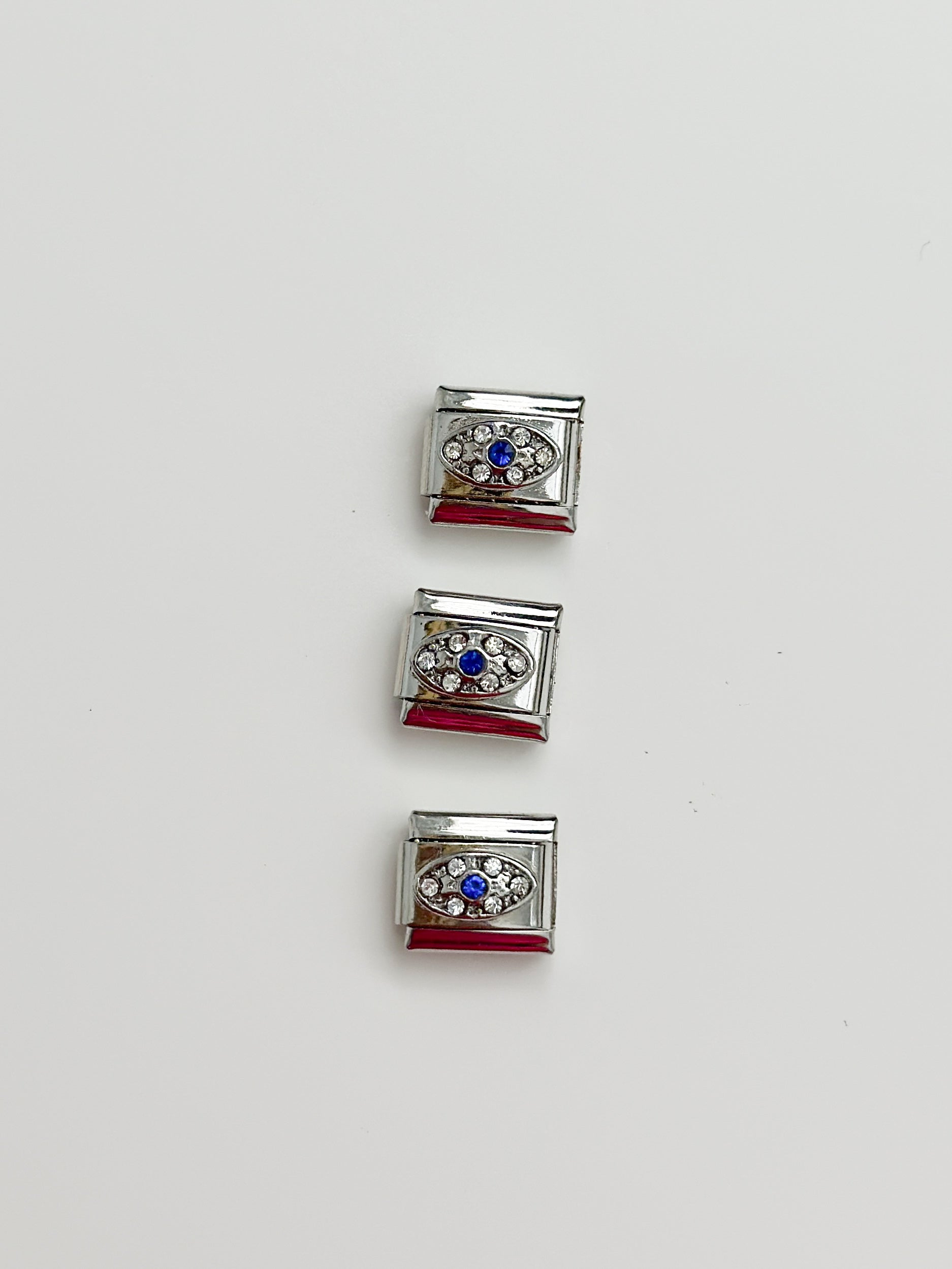 evil eye silver charm